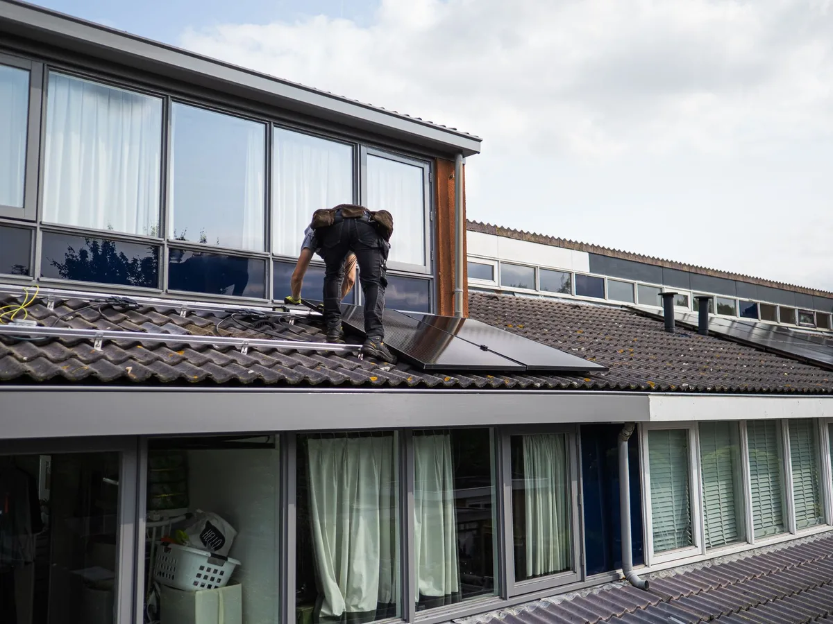 Travaux de rénovation et normes de performance énergétique dans un logement ancien