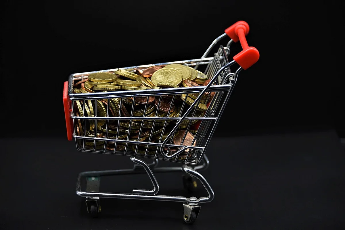 Schéma simplifié montrant la répartition d'un paiement par carte entre porteur, banque, réseaux et commerçant